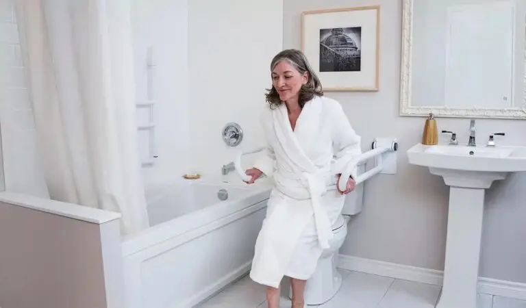 Elderly woman safely using her bathroom.