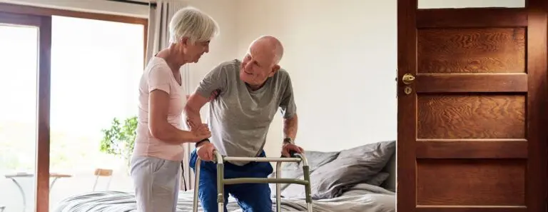 Elderly couple safely navigating their home.