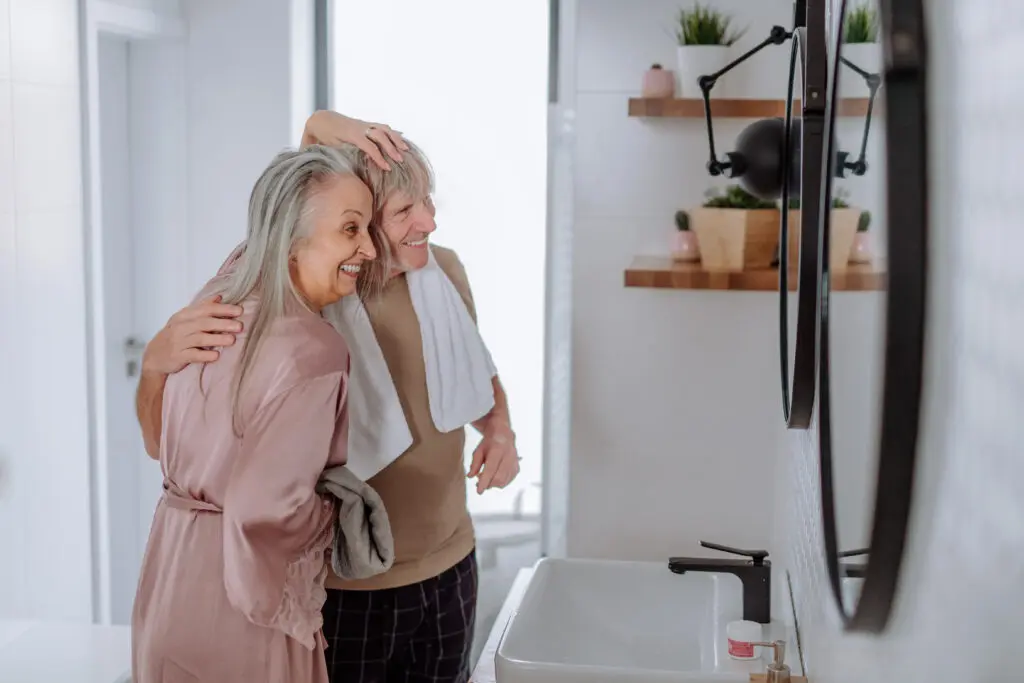 Senior couple in bathroom. Safe bathing options for seniors.