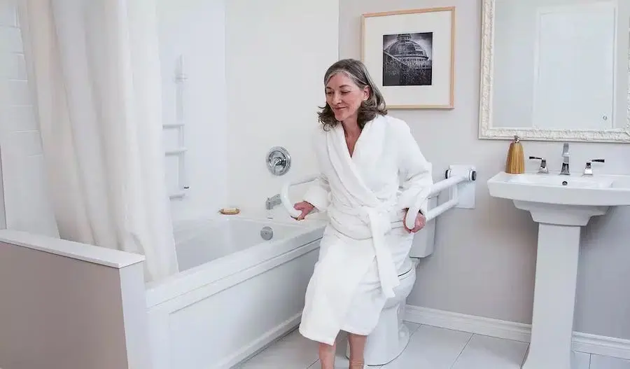 Modern bathroom remodel with walk-in shower and accessibility features